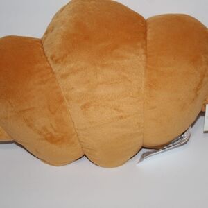 Croissant Shaped Plush Pillow 16 Inches Long 10 Wide
